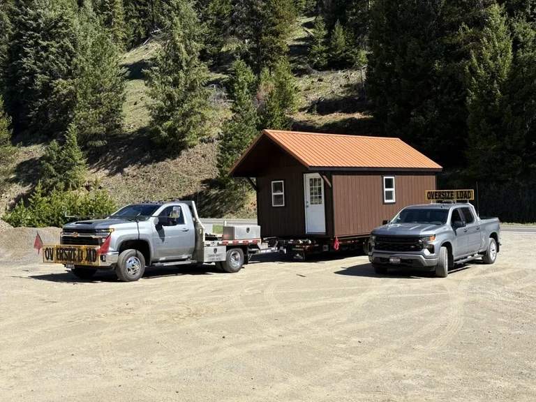 Positioning a large barn-style structure on a customer's property