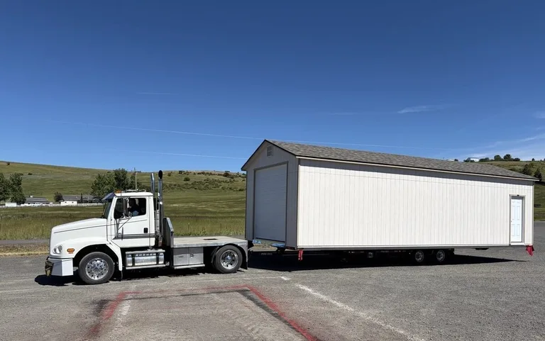 Clearwater Barns delivery vehicle on a country driveway